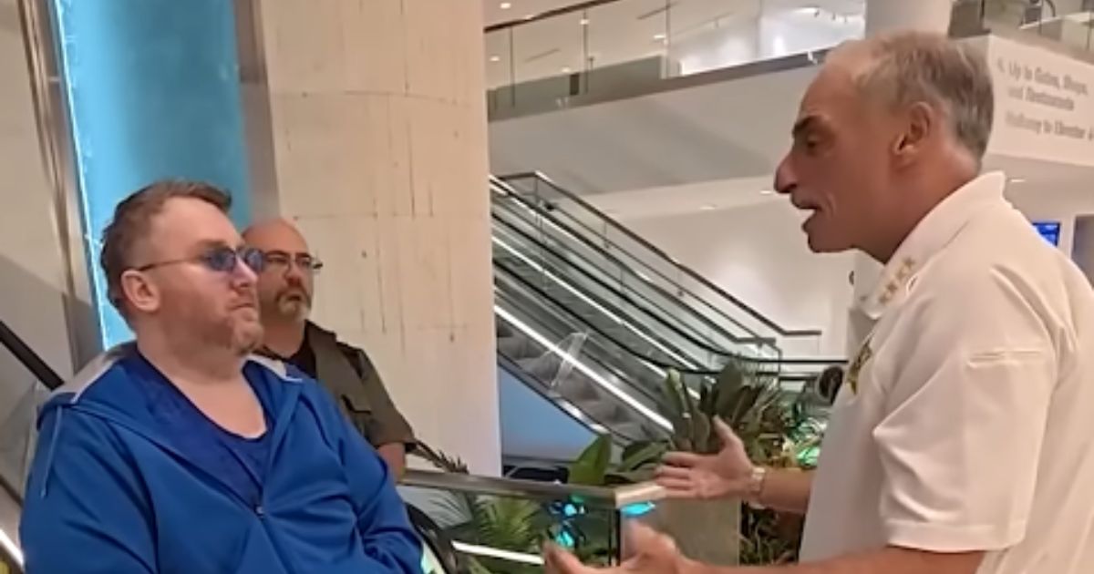 Matthew Moulton, 45, was confronted by the police officer he allegedly threatened to kill as he arrived in Florida on May 21, 2025, to face charges over the threats, as shown in footage obtained by the Volusia County Sheriff's Office.